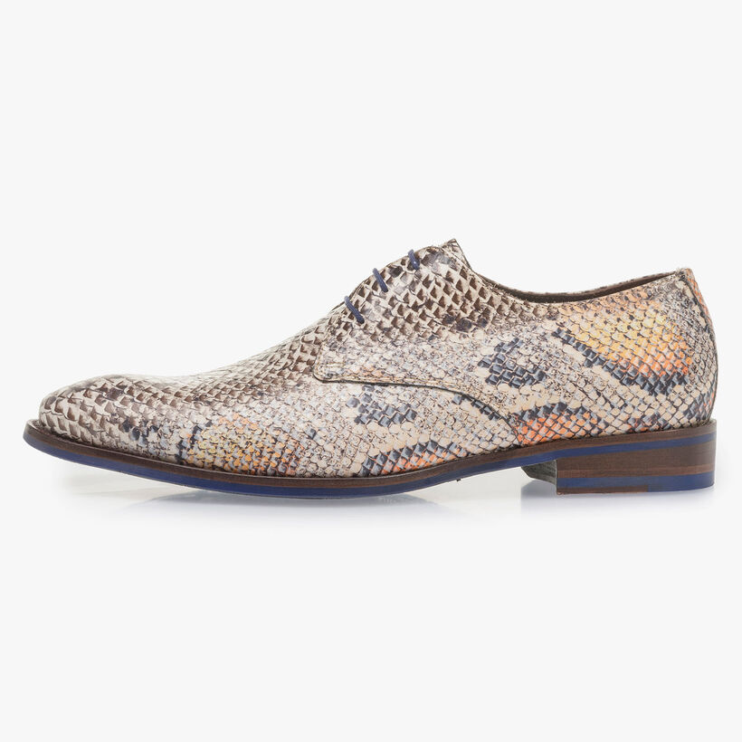 Premium lace shoe with an orange snake print