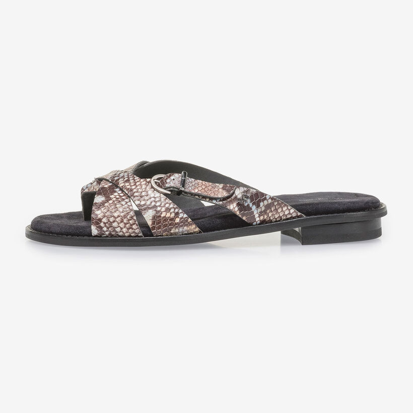 Brown and white leather slipper with snake print