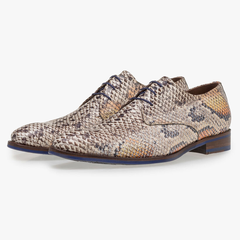 Premium lace shoe with an orange snake print
