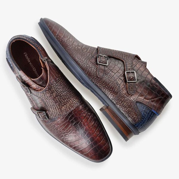 Dark brown buckled shoe with croco print
