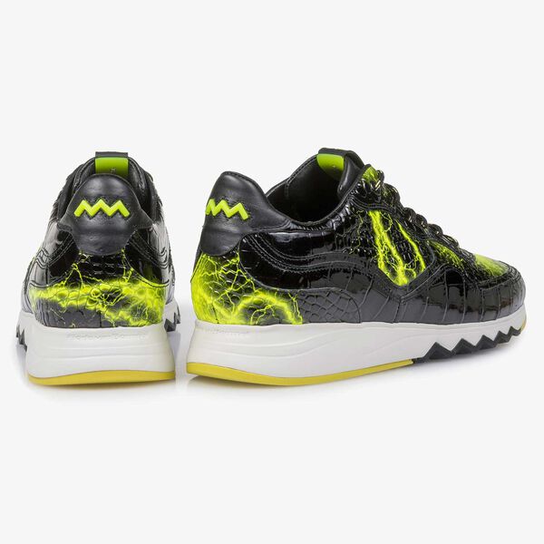 Black patent leather sneaker with yellow print