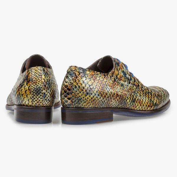 Yellow and brown patent leather snake print lace shoe