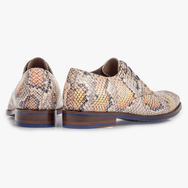 Premium lace shoe with an orange snake print
