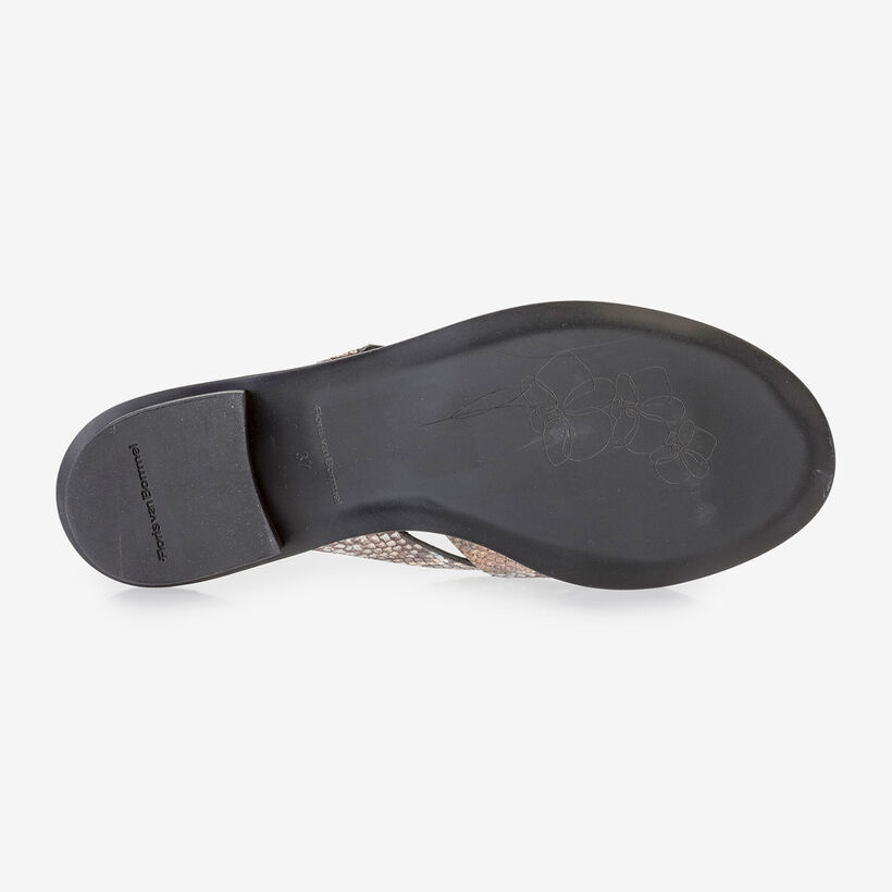 Brown and white leather slipper with snake print