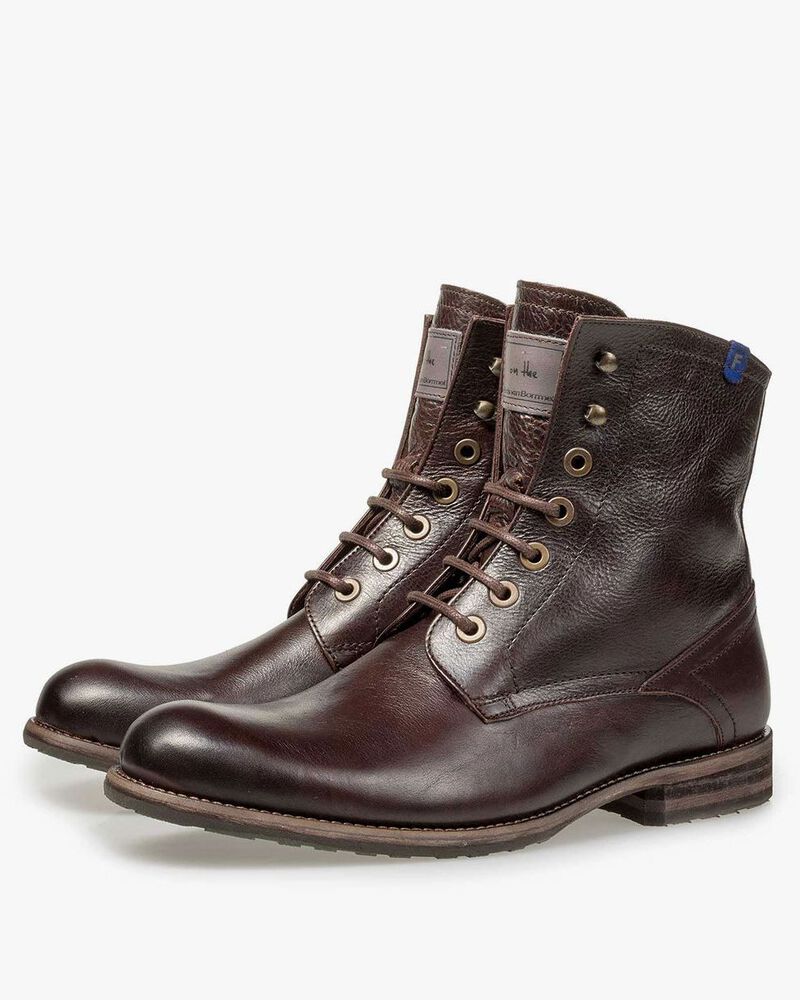 Mit Lammfell gef&uuml;tterter Schn&uuml;rstiefel braun