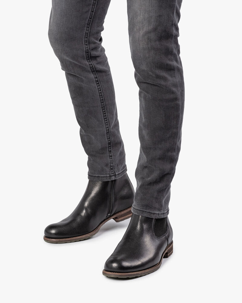 Mit Lammfell gef&uuml;tterter Chelsea Boot schwarz