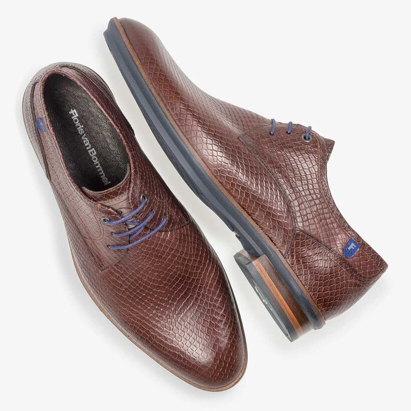 Cognac-coloured leather lace shoe with snake print