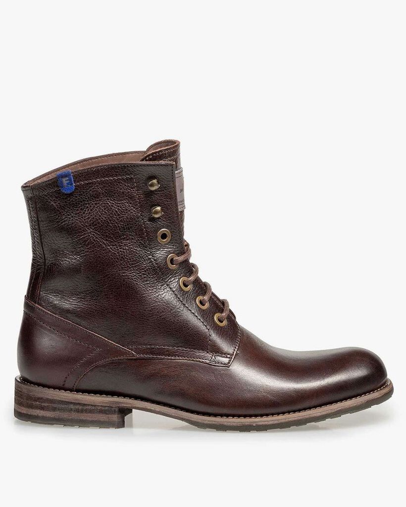 Mit Lammfell gef&uuml;tterter Schn&uuml;rstiefel braun